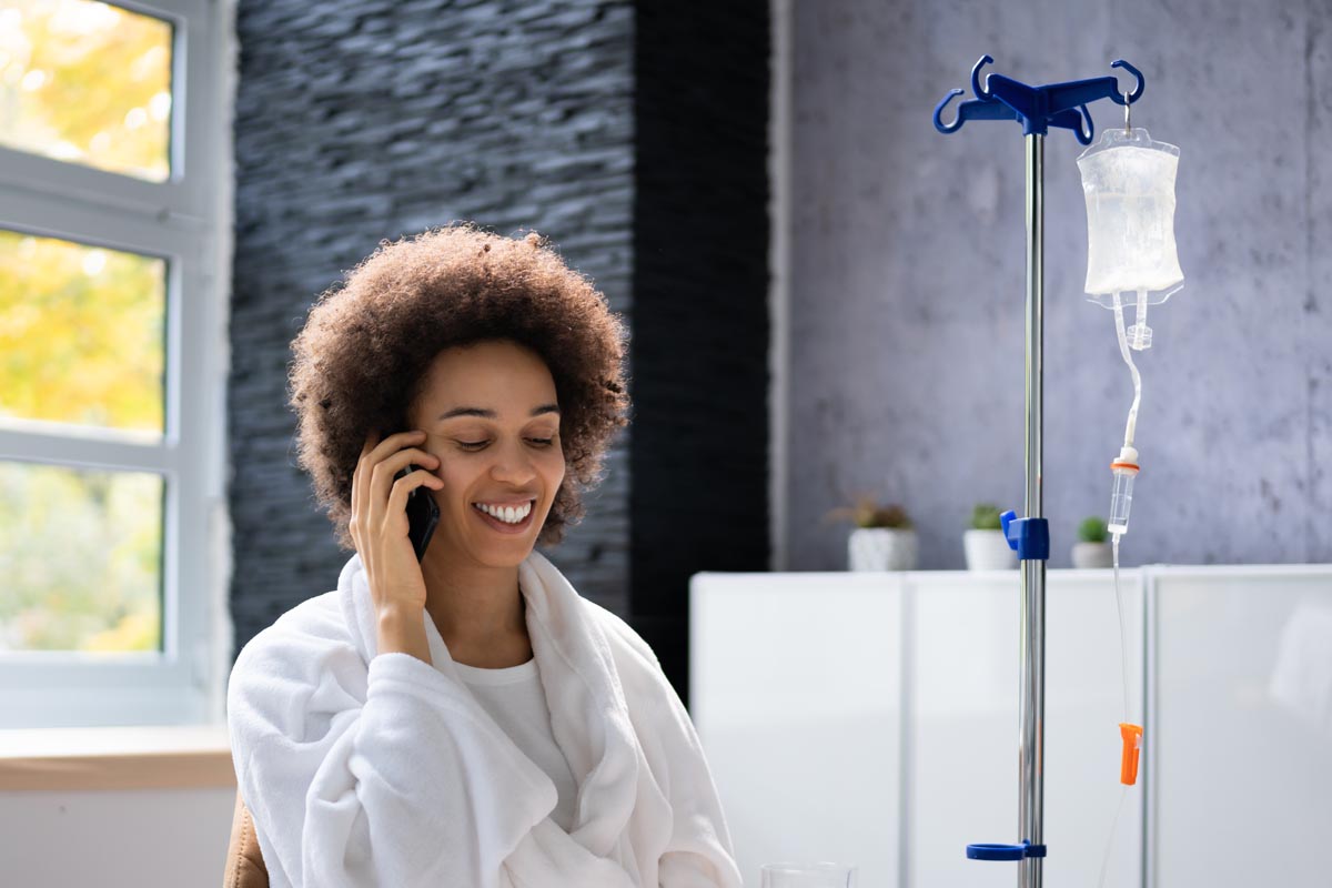 Person receiving Vitamin Therapy IV Drip Infusion