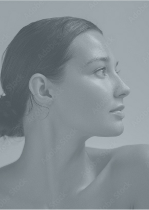 Profile of a serene woman with smooth skin, symbolizing rejuvenation and aesthetic transformation.