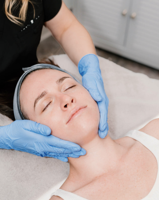 A relaxed client receiving a facial