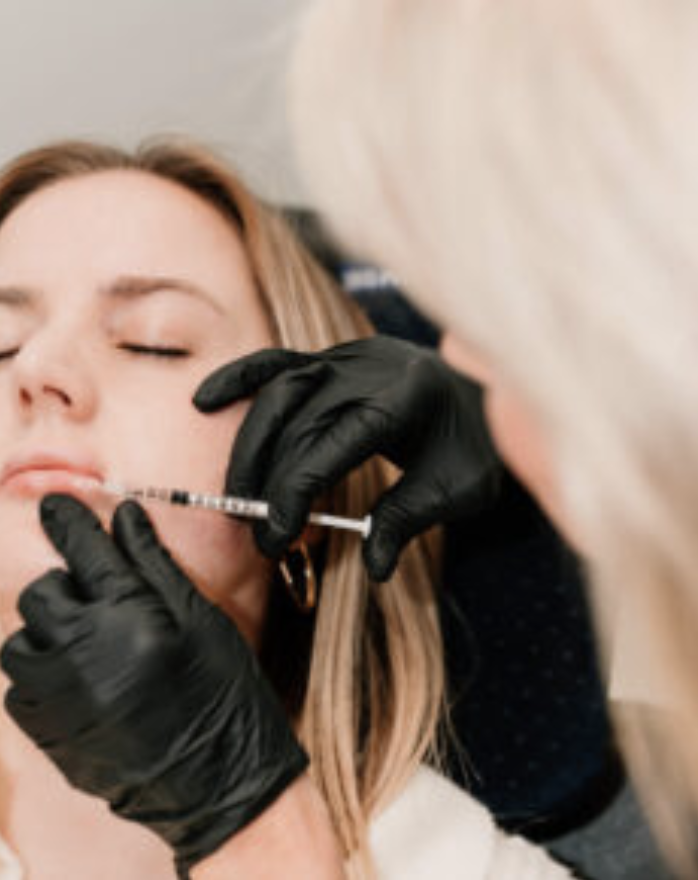 Close up image of a patient receiving an injectable cosmetic treatment.